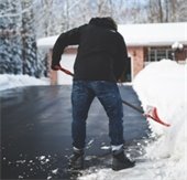 man shoveling snow