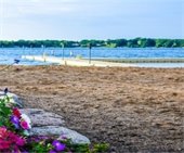 wayzata beach with colorful flowers