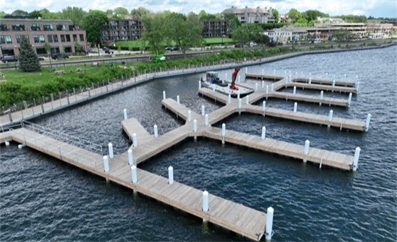 brand new docks on wayzata bay with a boardwalk next to it