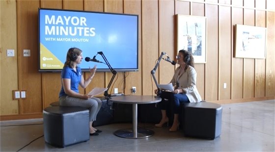 aurora yager and the mayor filming the city's podcast