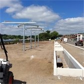 1.	Shade structure and stormwater treatment planters at the Lake Street Plaza Park