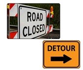 Stock image of road closed and detour signage