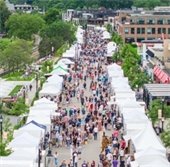 crowd of people at the wayzata art experience on lake street