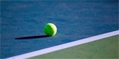 Tennis ball on tennis court