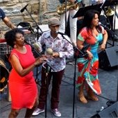 salsa del soul band playing music outside