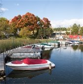 boats lined up in a marina in wayzata